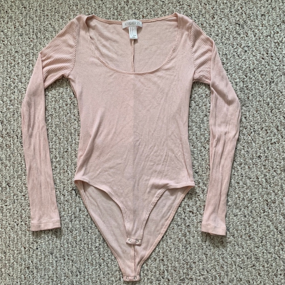 Light pink body suit